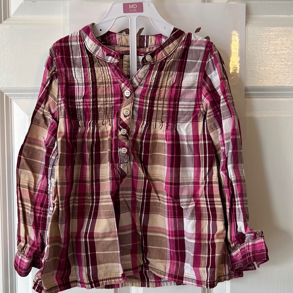 Label of graded goods size 2T long sleeve shirt excellent condition
